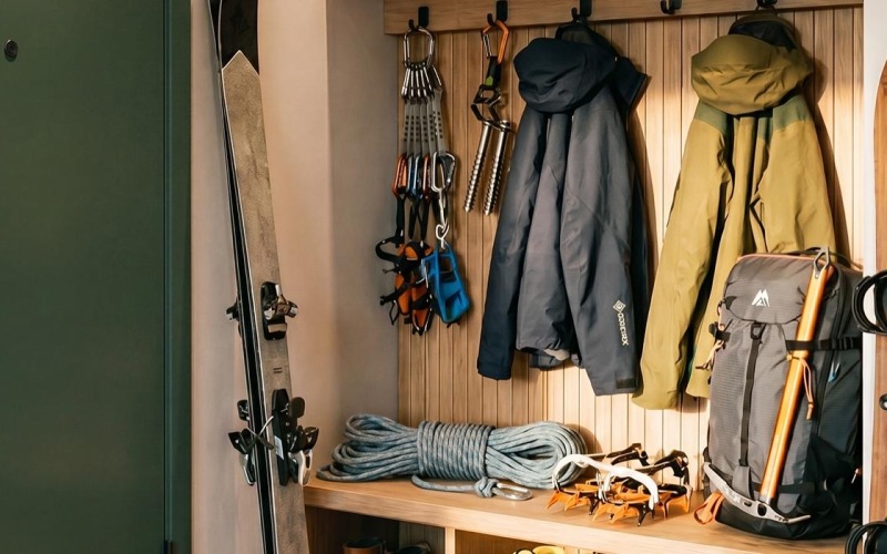 a closet with clothes and shoes